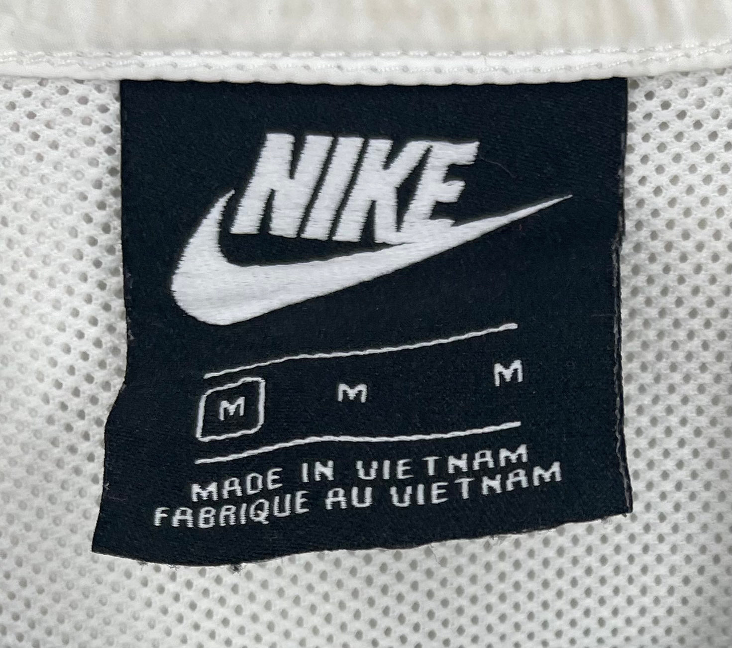 Nike Regenjacke Weiß/Schwarz Größe M