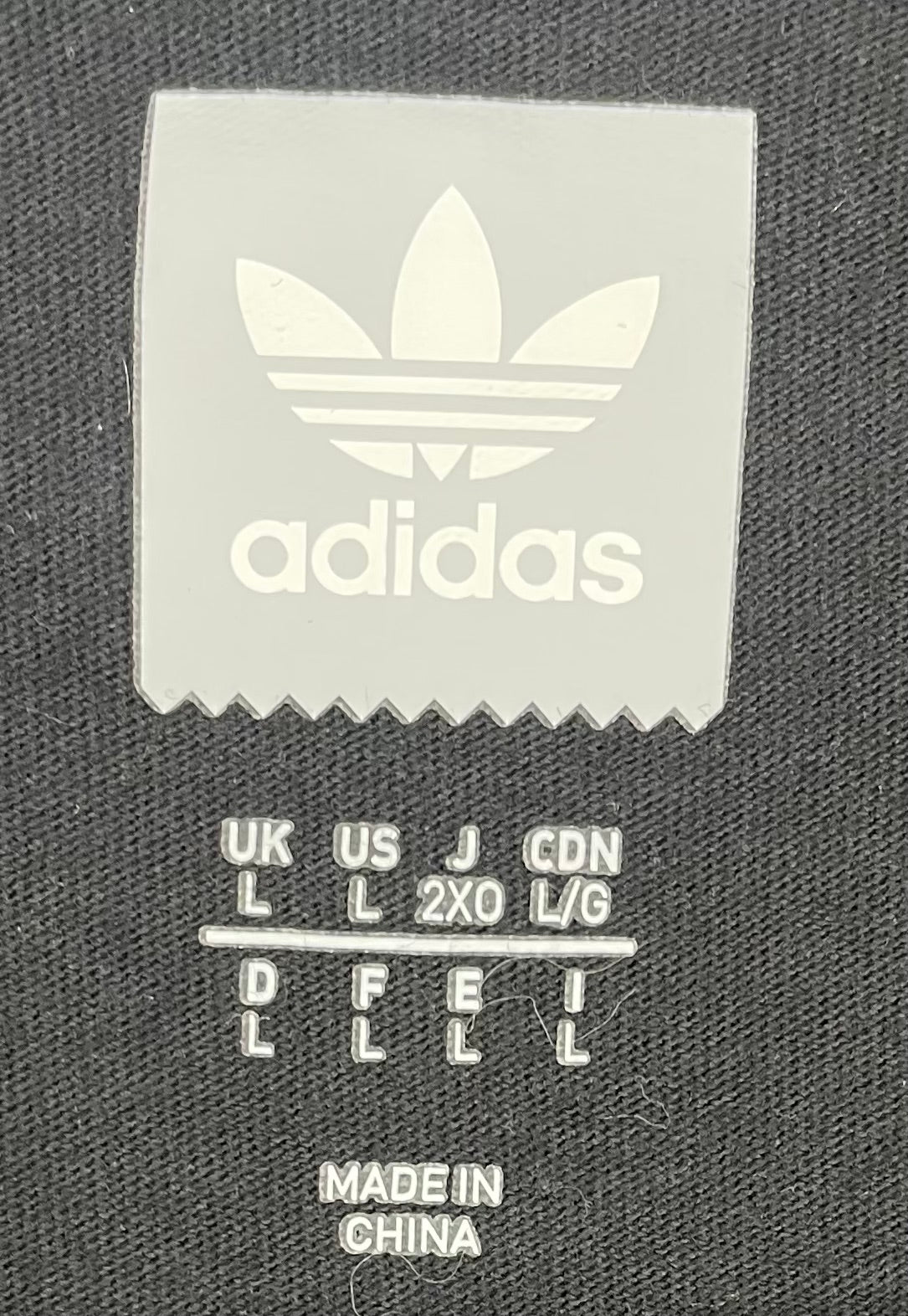 Adidas T-Shirt Originals Solid Shmoo Schwarz Größe L