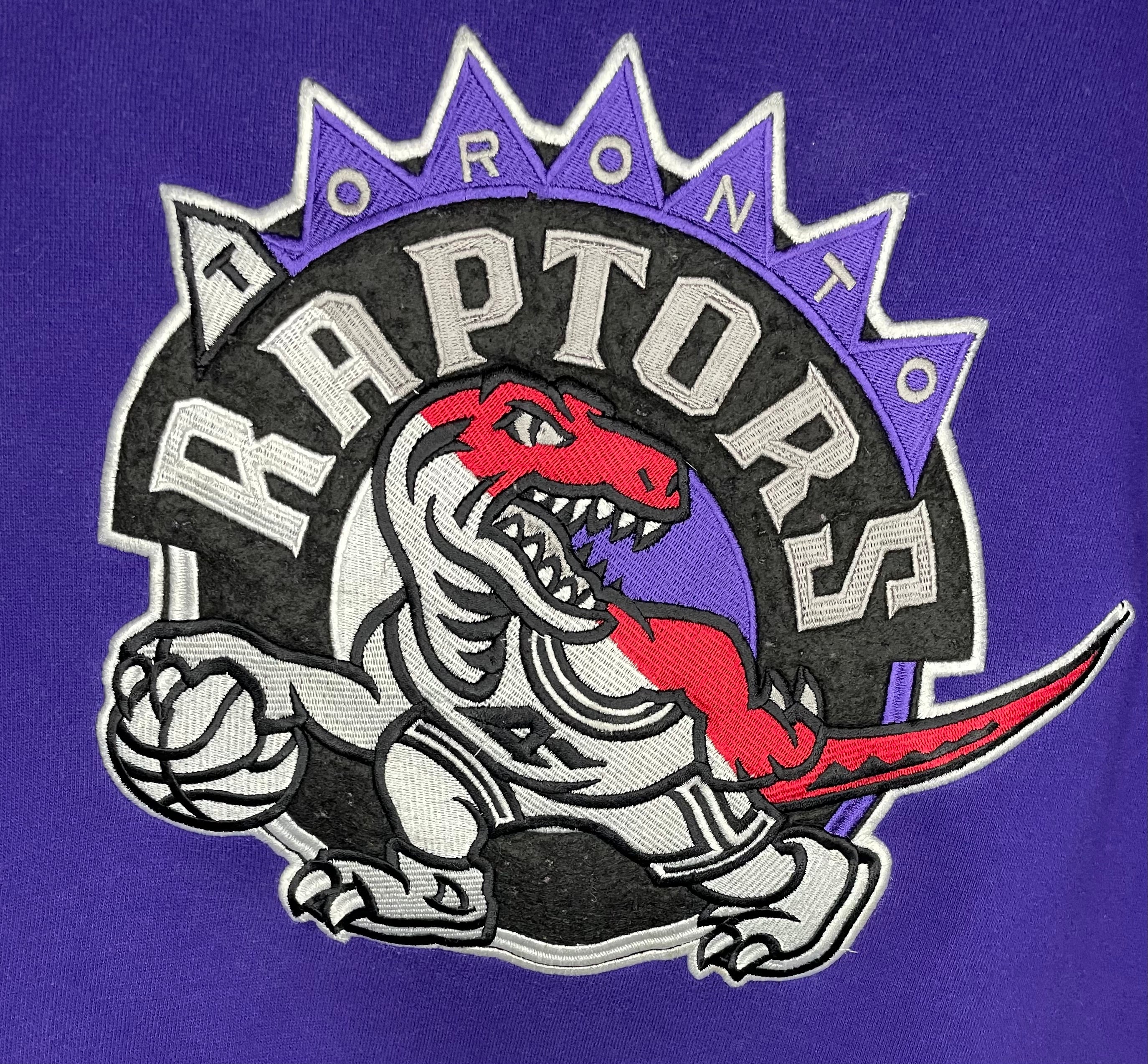 Mitchel & Ness Vintage Sweater Toronto Raptors Lila Größe L