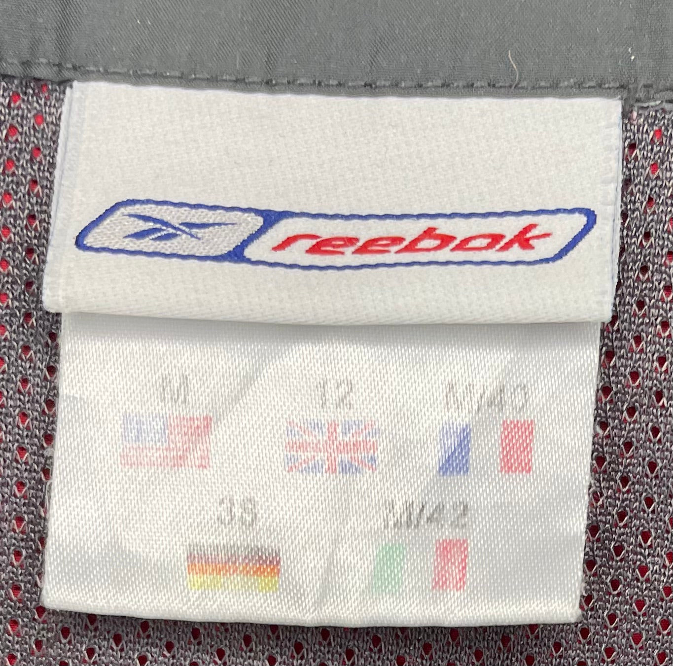 Reebok Vintage Laufweste Grau/Rot Größe M